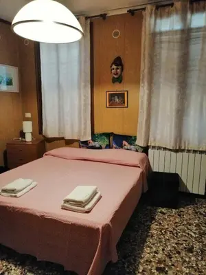 Letto o letti in una camera di Casetta Sulla Laguna