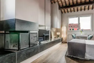 Area soggiorno di enJoy Home - Mansarda nel cuore di Padova