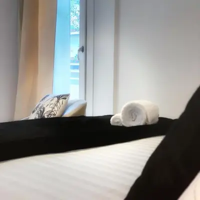 Letto o letti in una camera di THE FAHOUSE