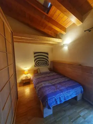 Letto o letti in una camera di Il Camino Rosso