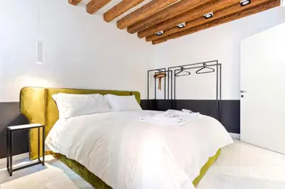 Letto o letti in una camera di Dimora San Lorenzo Luxury Apartment