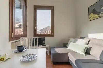 Area soggiorno di enJoy Home - Bilocale sulle Riviere nel cuore di Padova