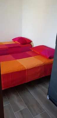 Letto o letti in una camera di La Maison de André