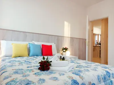 Letto o letti in una camera di Arcobaleno Room Venezia-Mestre