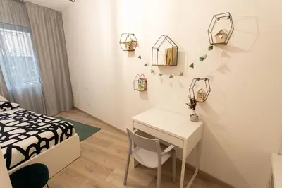 Letto o letti in una camera di Moderno Appartamento 140 Bassano Centro