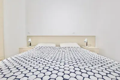 Letto o letti in una camera di Residence Apollo - Home Immobiliare Jesolo