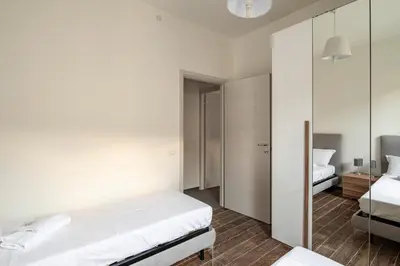 Letto o letti in una camera di San Vincenzo Apartments 1 - 2 - 4 Vigonza