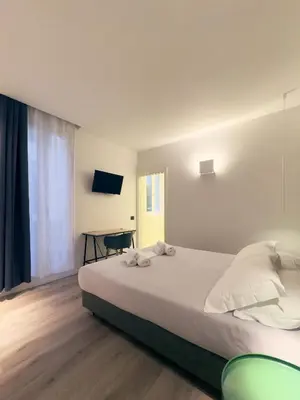 Letto o letti in una camera di Dimora in Prato