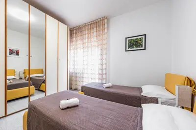 Letto o letti in una camera di Residence Fragole Apartment Venice