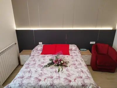 Letto o letti in una camera di Arcobaleno Rooms Mestre-Venezia