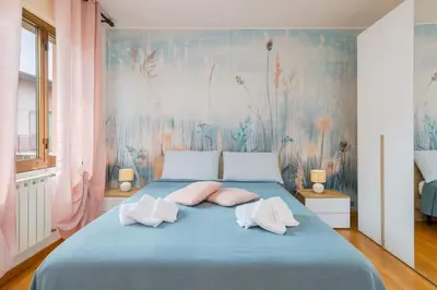Letto o letti in una camera di Gate1-MarcoPoloAirport-3 Camere da letto-Wifi-Netflix-15' da Venezia