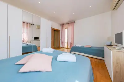 Letto o letti in una camera di Gate1-MarcoPoloAirport-3 Camere da letto-Wifi-Netflix-15' da Venezia