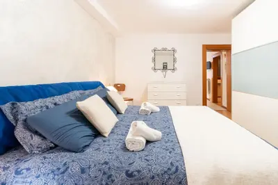 Letto o letti in una camera di La casa perfetta per le vacanze