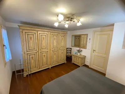 Letto o letti in una camera di Casa Rossa