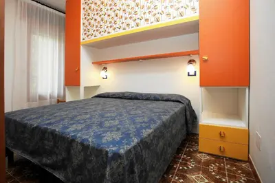 Letto o letti in una camera di Villa Roswal
