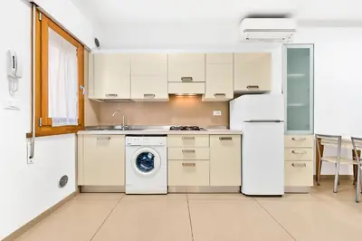 Cucina o angolo cottura di Jesolo Sun Beach House - Host Solution