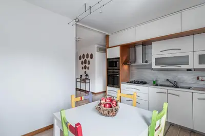 Cucina o angolo cottura di GuestHost - Padova Palestro Pastel Apartment