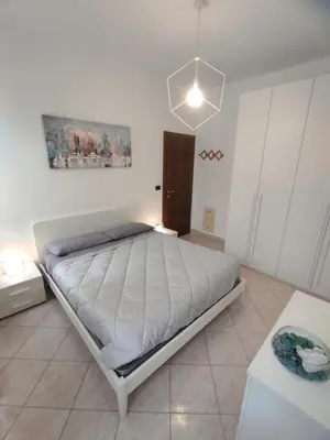Letto o letti in una camera di Casa Crispi con terrazza