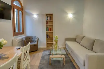 Area soggiorno di Ecco Suites Apartments