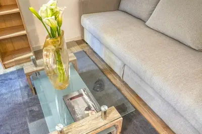 Area soggiorno di Ecco Suites Apartments