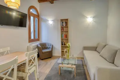 Area soggiorno di Ecco Suites Apartments