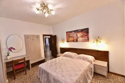 Letto o letti in una camera di Alla Corte Veneziana