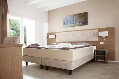 Letto o letti in una camera di Al Reparo