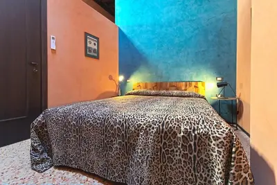Letto o letti in una camera di Ca'Ranieri Tenti (Design House)