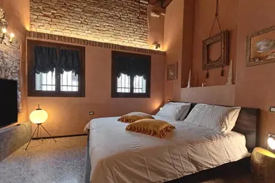 Letto o letti in una camera di Ca'Ranieri Tenti (Design House)