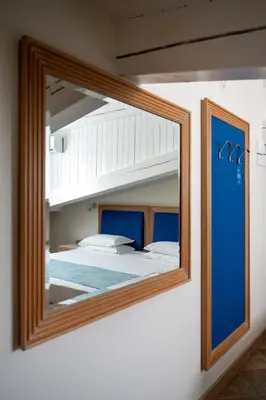 Letto o letti in una camera di La Dépendance by Casa Bianca