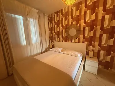 Letto o letti in una camera di Apartment Solmare-15 by Interhome