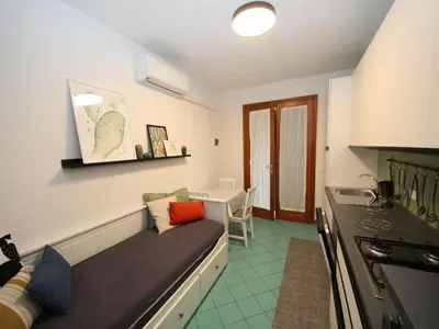 Area soggiorno di Apartment Solmare-15 by Interhome