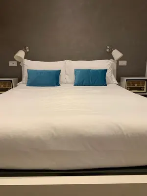 Letto o letti in una camera di Ca’ dei Pasi