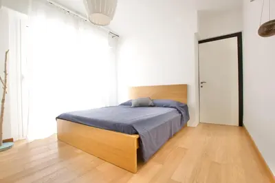 Letto o letti in una camera di Condominio Bagni - Home Immobiliare Jesolo