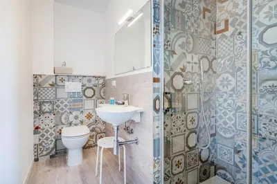 Bagno di GuestHost - Family & Friends Rooms