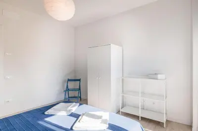 Letto o letti in una camera di GuestHost - Family & Friends Rooms