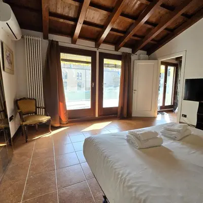 Letto o letti in una camera di Anna's Garden Venice