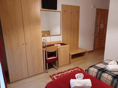Letto o letti in una camera di Albergo Dalla Mena