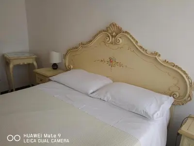 Letto o letti in una camera di Alloggi Gerotto Calderan 3