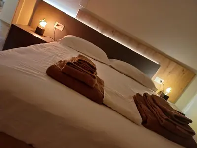 Letto o letti in una camera di G83Home-Appartamento moderno in zona Fiera
