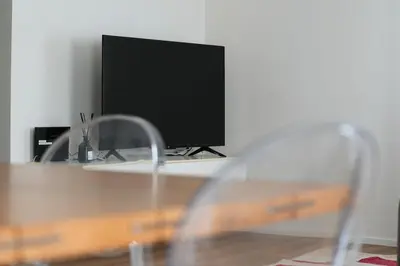 TV o dispositivi per l'intrattenimento presso G83Home-Appartamento moderno in zona Fiera