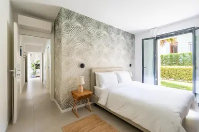 Letto o letti in una camera di Vibra Moorea