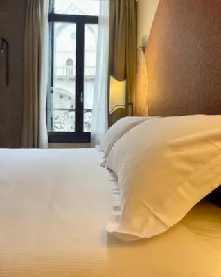 Letto o letti in una camera di 286 Piazza San Marco - Relais il Doge