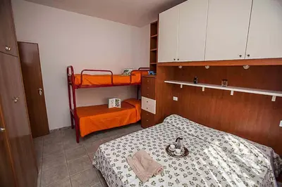 Letto o letti in una camera di Apartment in Rosolina Mare 43995