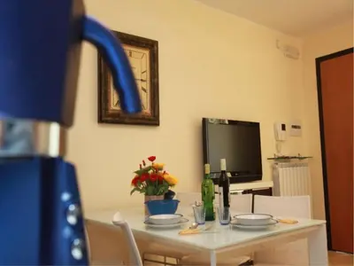 Cucina o angolo cottura di Beachfront apartment in Rosolina Mare