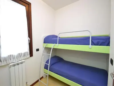 Letto o letti in una camera di Beachfront apartment in Rosolina Mare