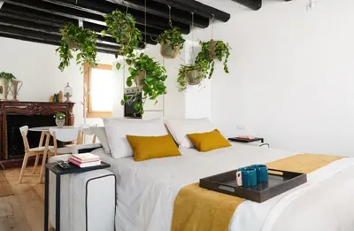 Letto o letti in una camera di Dimore Getaway Apartments