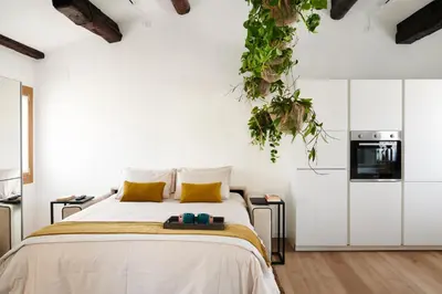 Letto o letti in una camera di Dimore Getaway Apartments