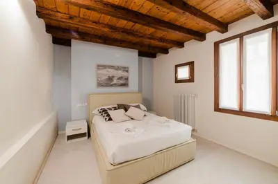 Letto o letti in una camera di Al Campiello