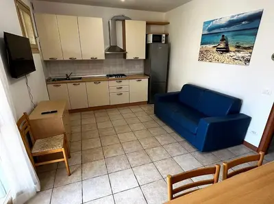 Cucina o angolo cottura di Family Garden Apartment – Borgo dei Fiori